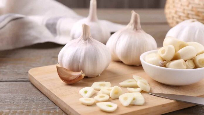 Fresh garlic cloves showing natural health benefits